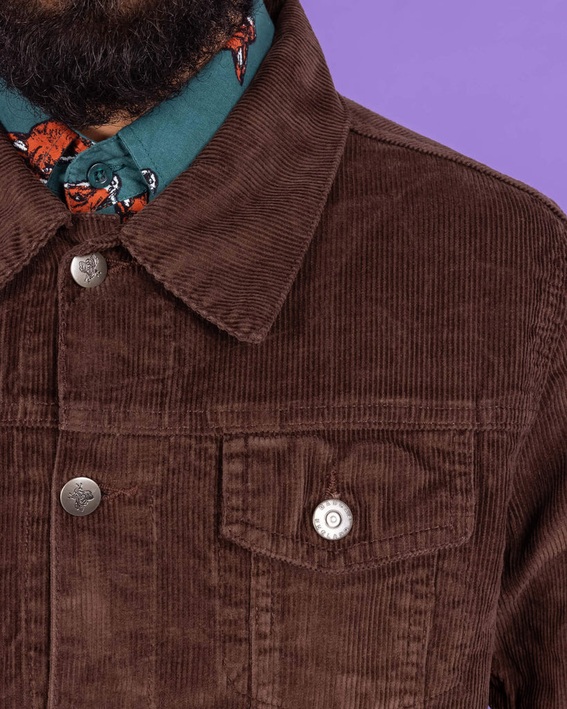 Close up of Richard wearing the Retro Vintage Cocoa Brown Corduroy Unisex Western Jacket buttoned up with Preppy Foxy Short Sleeve Shirt underneath.