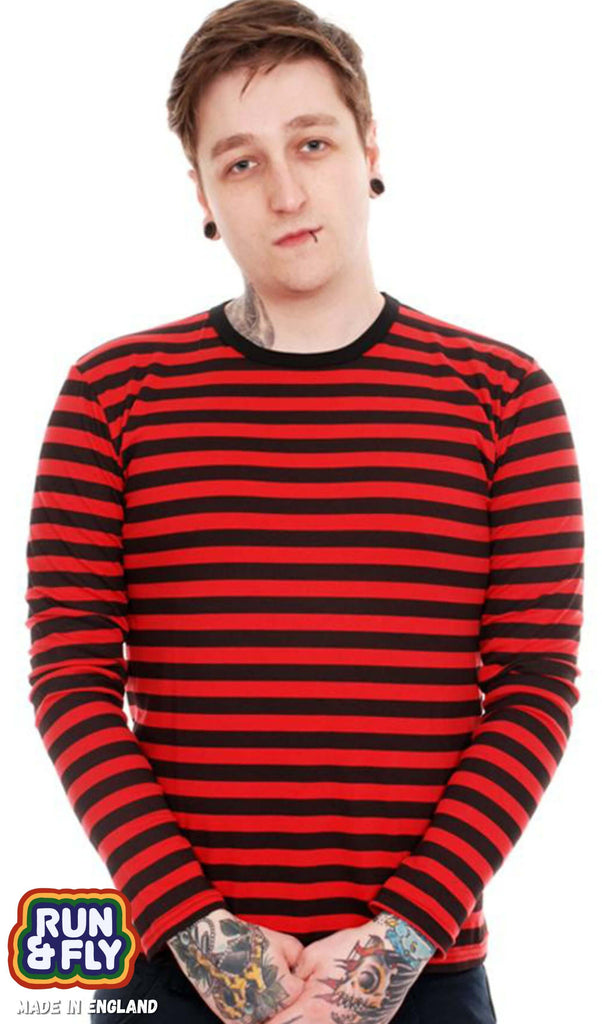 A heavily tattooed model with a lip ring wearing the Black & Red Stripe Long Sleeve T Shirt with dark jeans