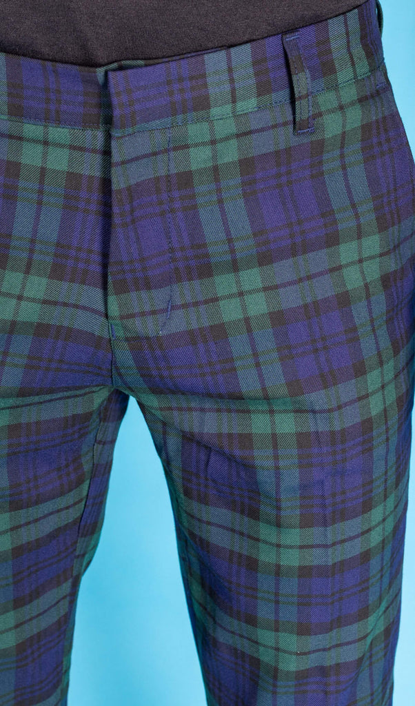 Close up shot of the front zip fly close on the retro mod stretch black watch tartan trousers.