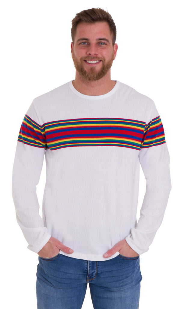 Male model smiling, standing against a white background, wearing the Retro Rainbow Engineered Striped Long Sleeve T Shirt with blue jeans
