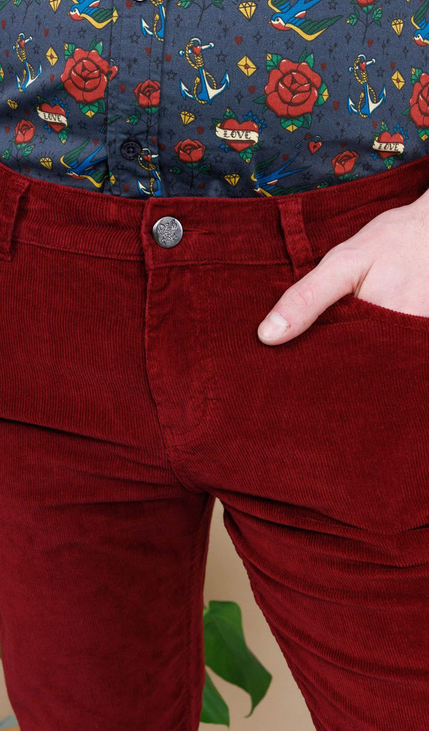 close up of Dec's hand in the pocket of the Tawney Port Corduroy Bell Bottom Flares.