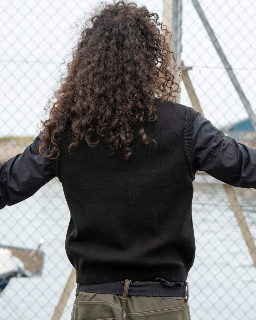 Back view of the Run & Fly BOO! Tank Vest showing the plain black knit design. Made in England and styled by model Rich.