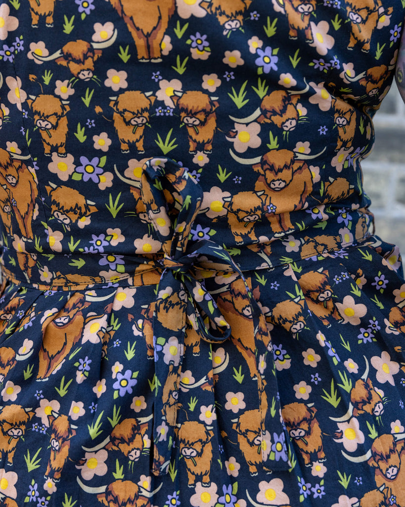 close up of the Jen James Highland cow print tied at the back