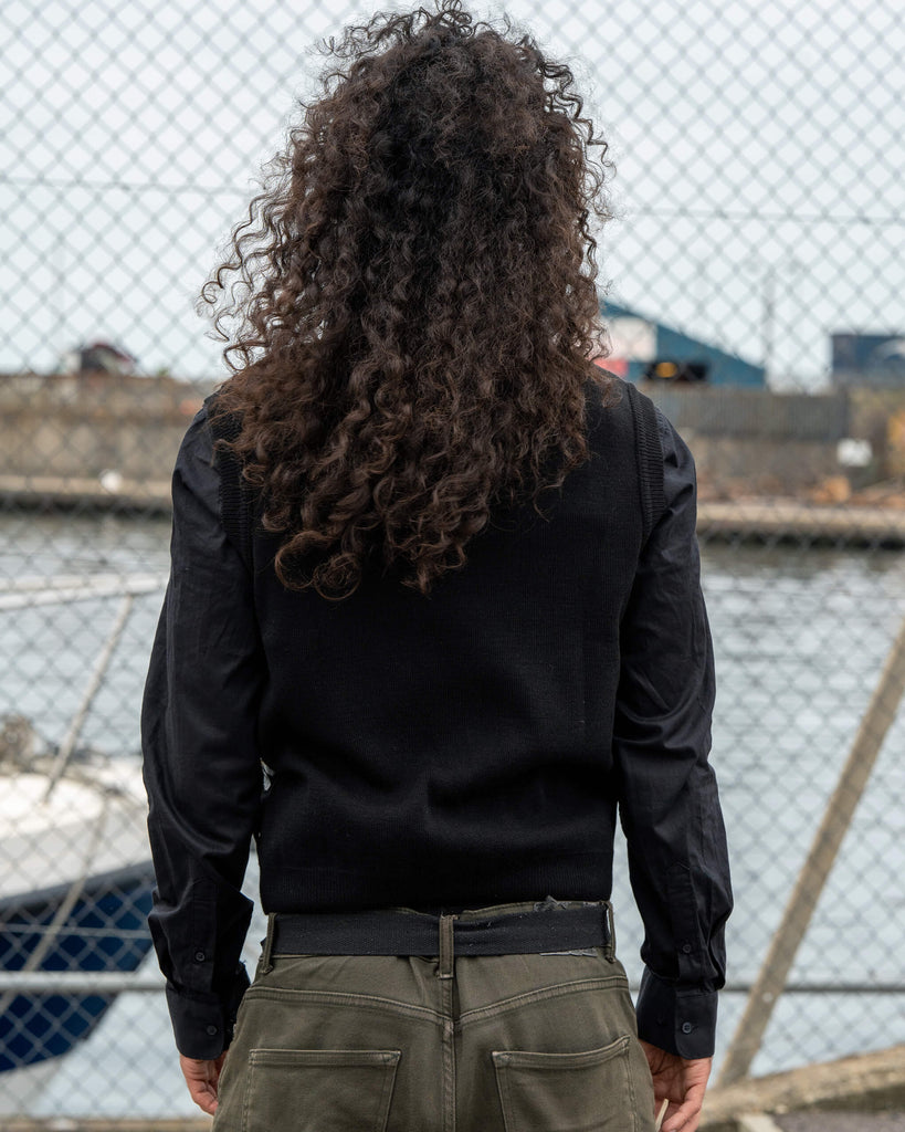 Back view of the Run & Fly Black Daisy Tank Vest showing the plain black design. Made in England and styled by model Rich for a unisex fit.
