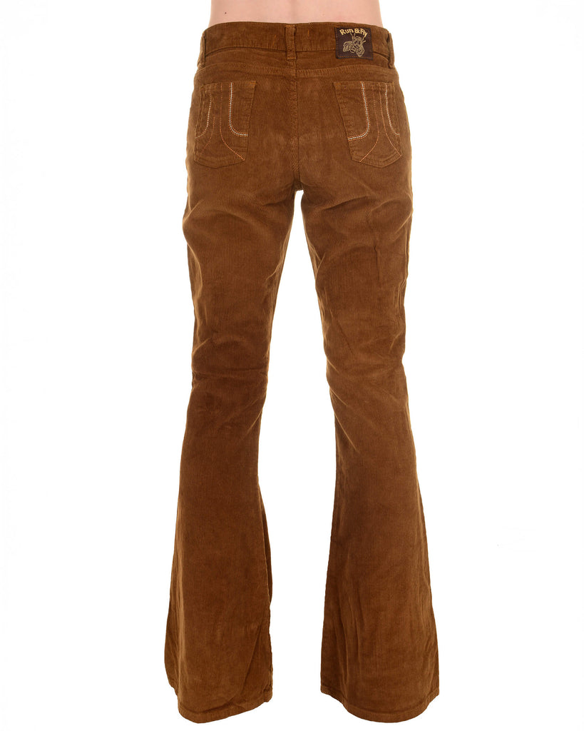 A back view of the Tobacco Corduroy Bell Bottom Super Flare Trousers by Run & Fly, a small ethical slow fashion brand. The trousers have a mid-waisted fit, detailed stitching on the back pockets, and a super flare leg that extends wide from the knee down. Made from soft corduroy fabric in a warm tobacco shade, perfect for retro-inspired outfits.
