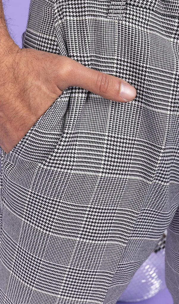 Close up of model's hand in the pocket of the Retro Mod Prince Of Wales Stretch Slim Skinny Fitting Trousers.