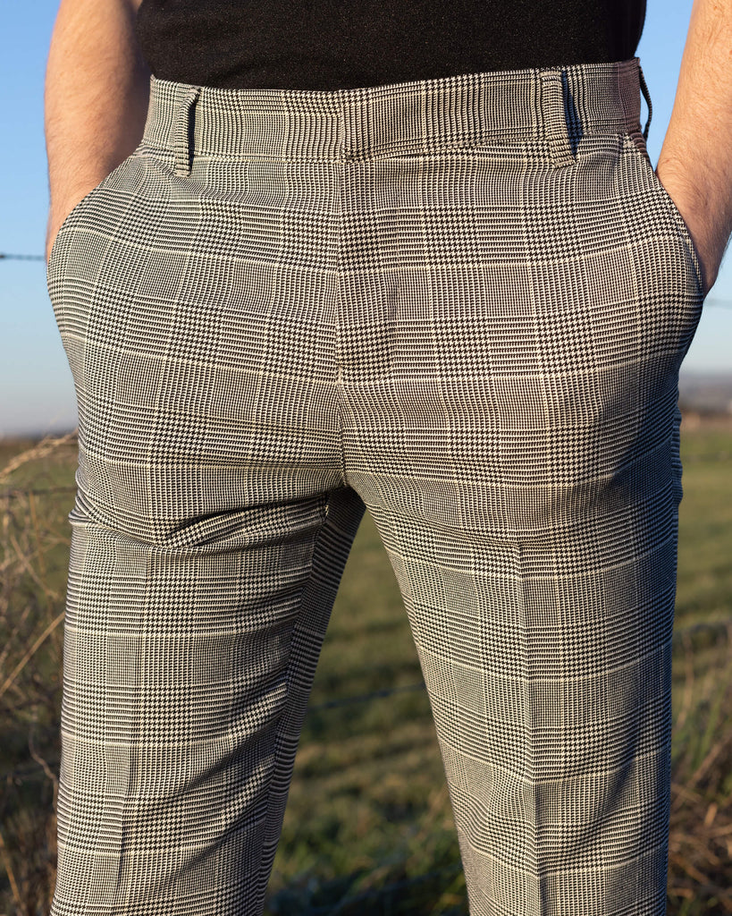 close up of the back pocket and belt loops on the Presley Prince Of Wales Check Bell Bottom Trousers.