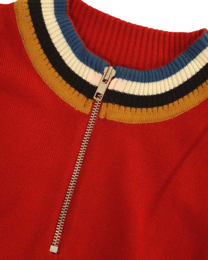 Flat lay showing off of the neck and zip of the red retro zip neck jumper