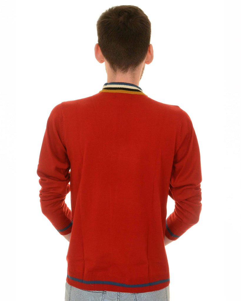  Back view of model against a white background, showing off the back of the red retro zip neck jumper