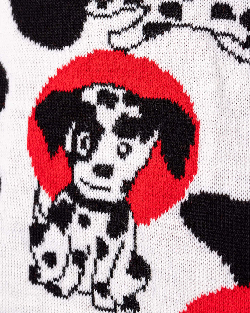Close up shot of the seeing spots Dalmatian knitted tank top front, showing a Dalmatian on a white background with red spots behind.