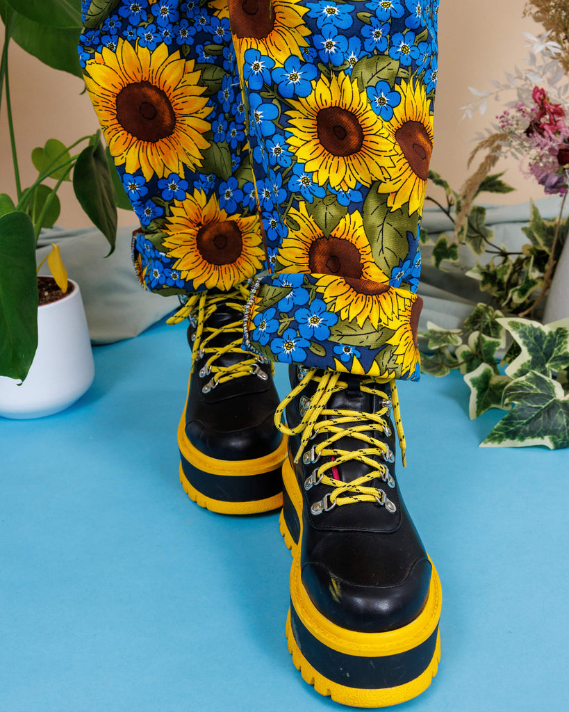 close up of the matching turn ups of the forget me not dungarees